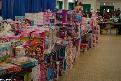 Photo by: Paul Moureaux of pmxphotography.com A picture of one toy aisle at the Christmas Gift Mart. 